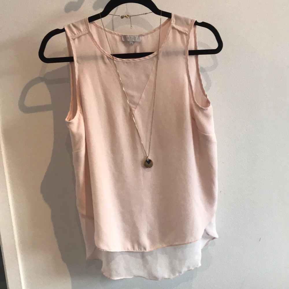 Three tops for the price of one! All gently used